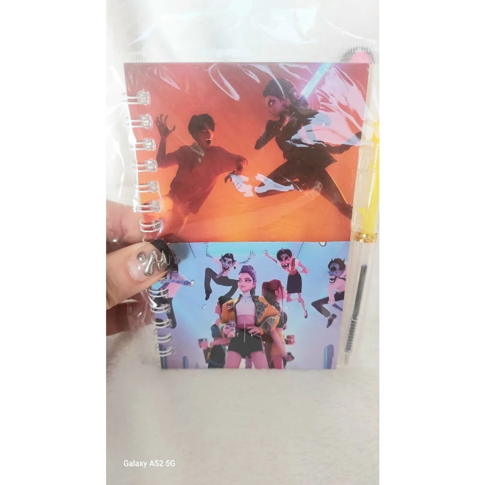 Be on the KPOP scene with Rumi, Mira, & Zoey. With this Notebook and Coin purse